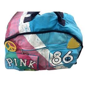 PINK Vintage Rare VS Peace University rolling Duffle luggage bag 2007
Years